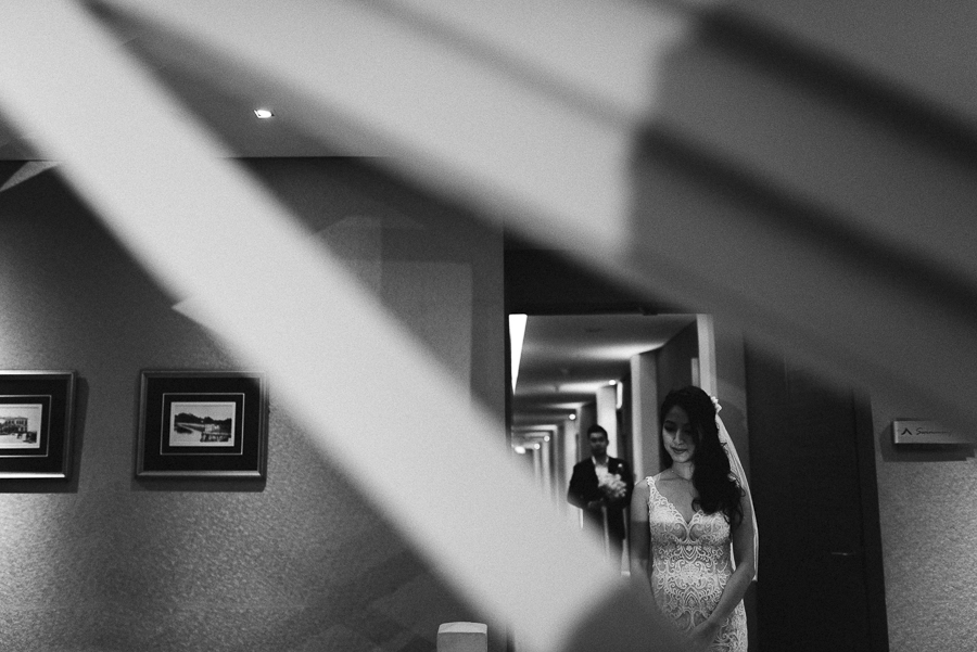 bride and groom first look at fort canning hotel wedding