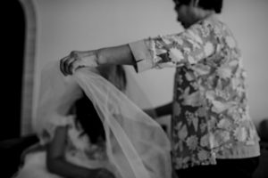 Mother veiling bride. Singapore Wedding Photography